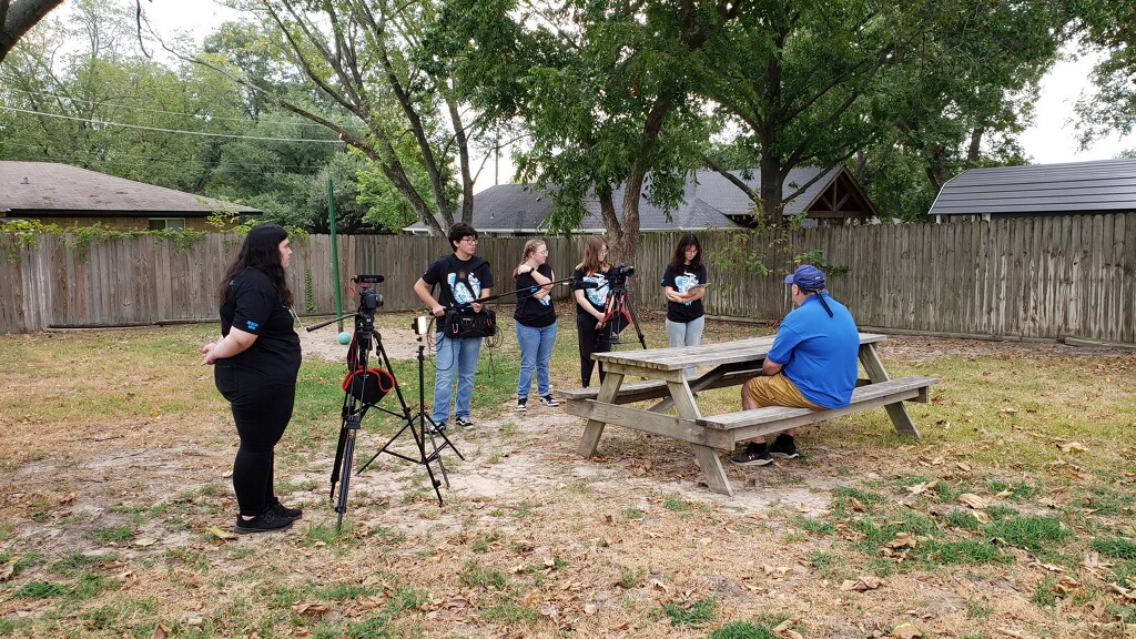 The EagleVision film team conducts an interview for one of their documentary films. They produced three total documentaries this year.