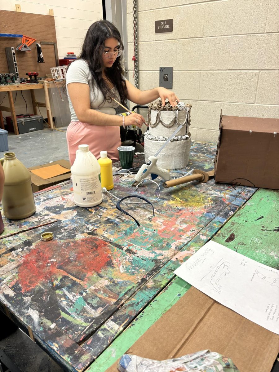 Sophomore Bethany Garcia works on her prop project. Students have the option to keep their projects or donate them to the theater department.
