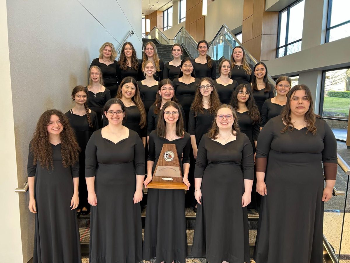 The treble choir team posing with their sweepstakes award after UIL. This means they earned straight first divisons.