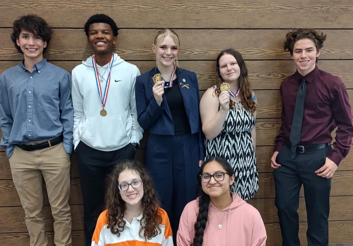 The debate team poses after competing at 4A congress regions. From left to right on top is sophomore Conner Stevens, junior Kylon Kincade, junior Hailey Maccalous, junior Madison Barnes and sophomore Ethan Barchek, and on bottom form left to right is sophomore Audrey Ratliff and senior Flor Mendez.